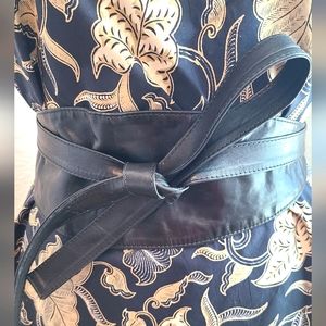 Specially cured soft leather belt made in Belgium.